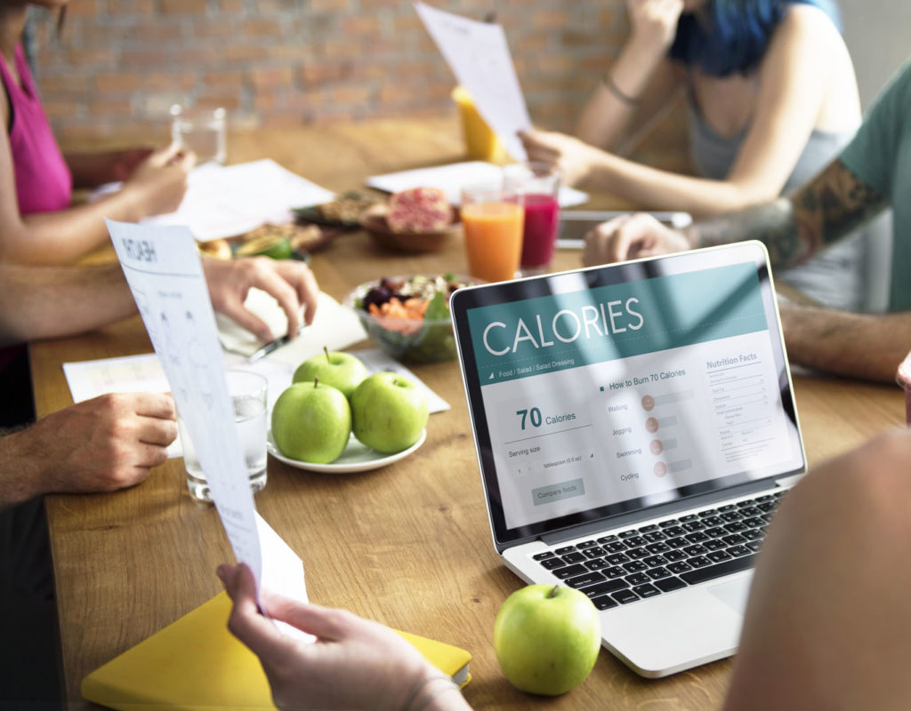 a group of healthy people using laptop